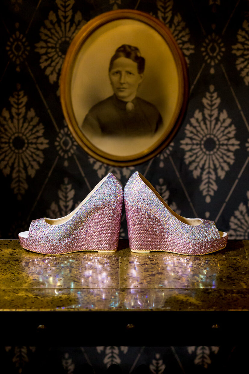 Sparkly pink shoes, this wedding started at the Graham Hotel in Washington DC, the ceremony and the reception were at Sequoia, this photo is a detail shot of platform pink and silver ombre heels that are sparkly and modern, they juxtaposed with a vintage oval shaped cameo photograph that is dingy and old, Procopio Photography, best top Washington DC photographer, best top Maryland photographer, best top Virginia photographer, best top DMV photographer, best top wedding photographer, best top commercial photographer, best top portrait photographer, best top boudoir photographer, modern fine art portraits, dramatic, unique, different, bold, editorial, photojournalism, award winning photographer, published photographer, memorable images, be different, stand out