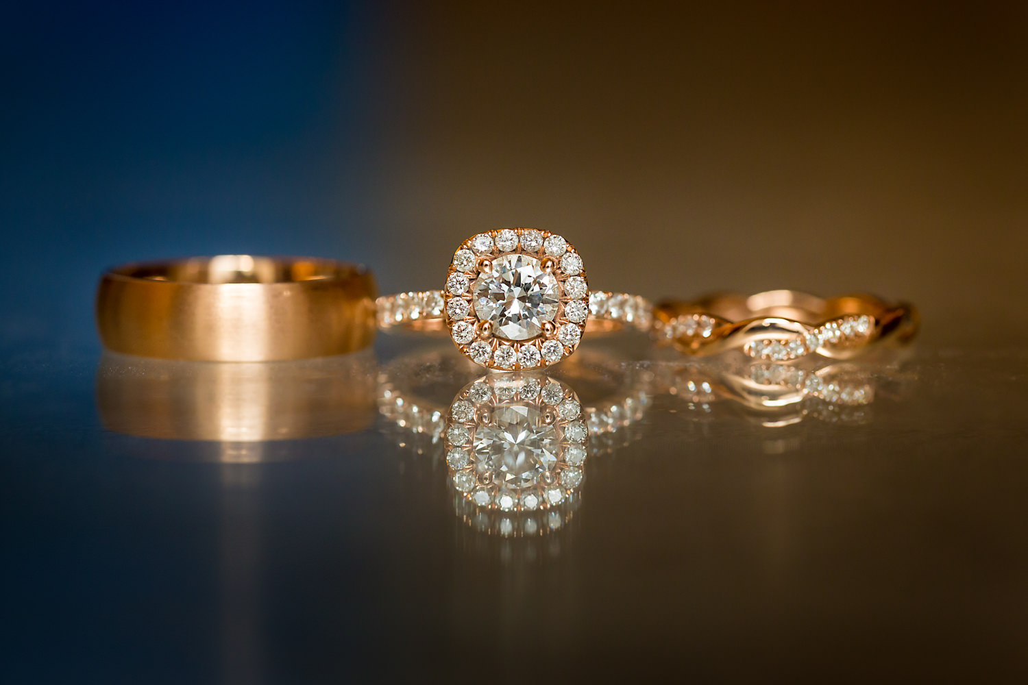 this photo is a wedding ring shot, the rose gold rings and their reflection are simple but beautiful, Procopio Photography, best top Washington DC photographer, best top Maryland photographer, best top Virginia photographer, best top DMV photographer, best top wedding photographer, best top commercial photographer, best top portrait photographer, best top boudoir photographer, modern fine art portraits, dramatic, unique, different, bold, editorial, photojournalism, award winning photographer, published photographer, memorable images, be different, stand out