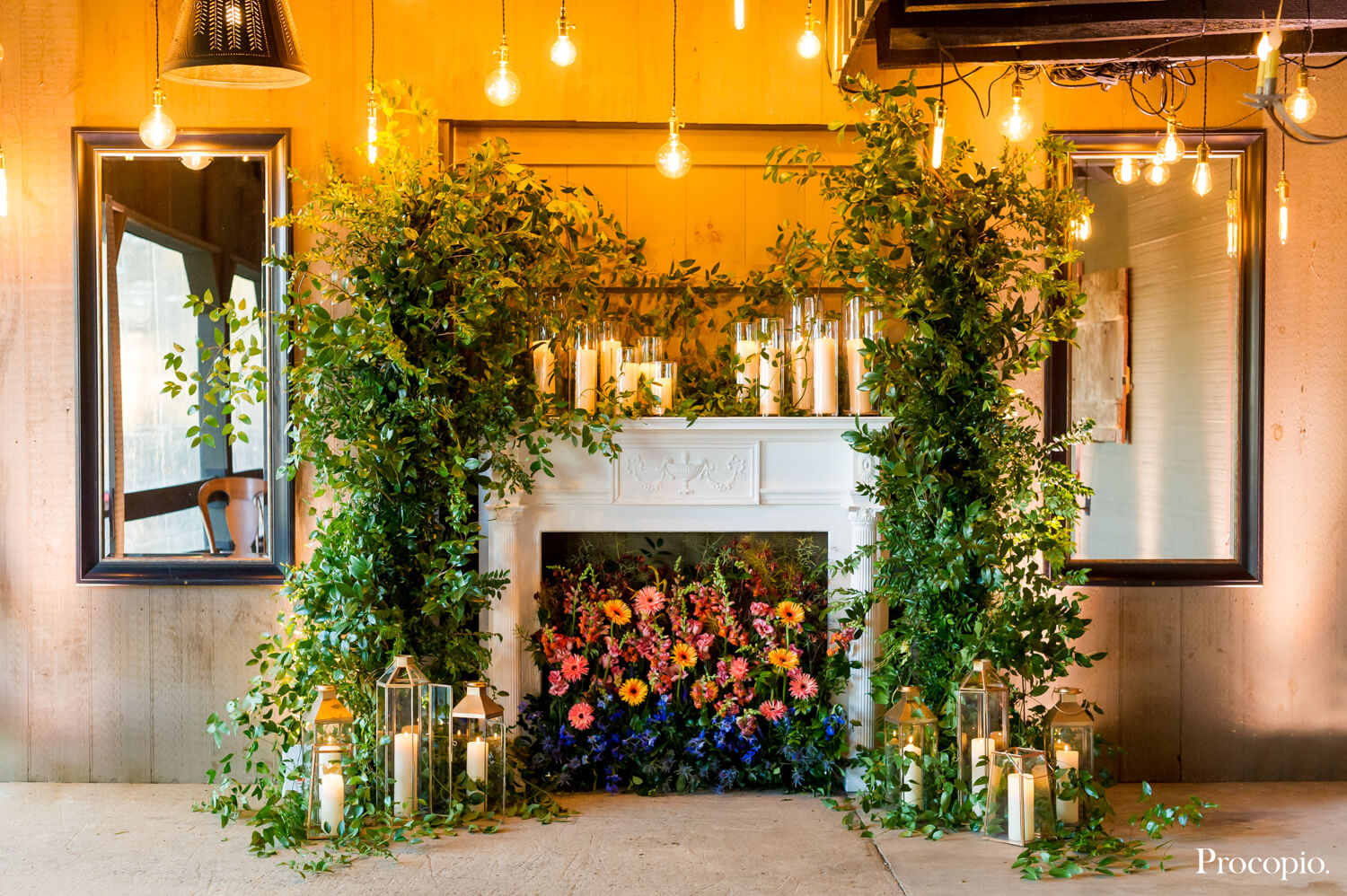 Flower filled fireplace with candles Bellwether Events - best Washington DC wedding planner - photo by Procopio Photography