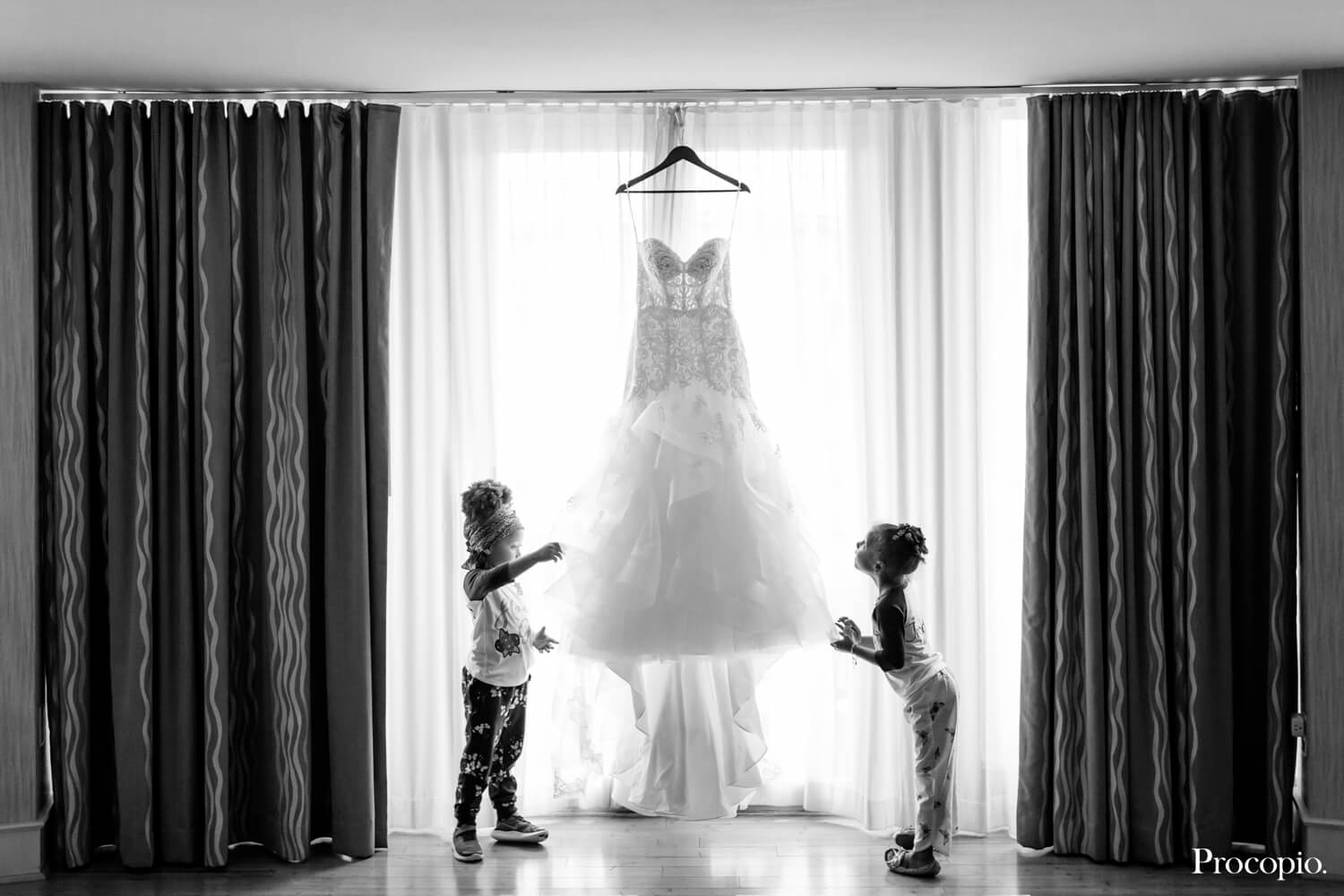 Little girls gazing at wedding dress  - Perfect Planning Events - best Washington DC wedding planner - photo by Procopio Photography