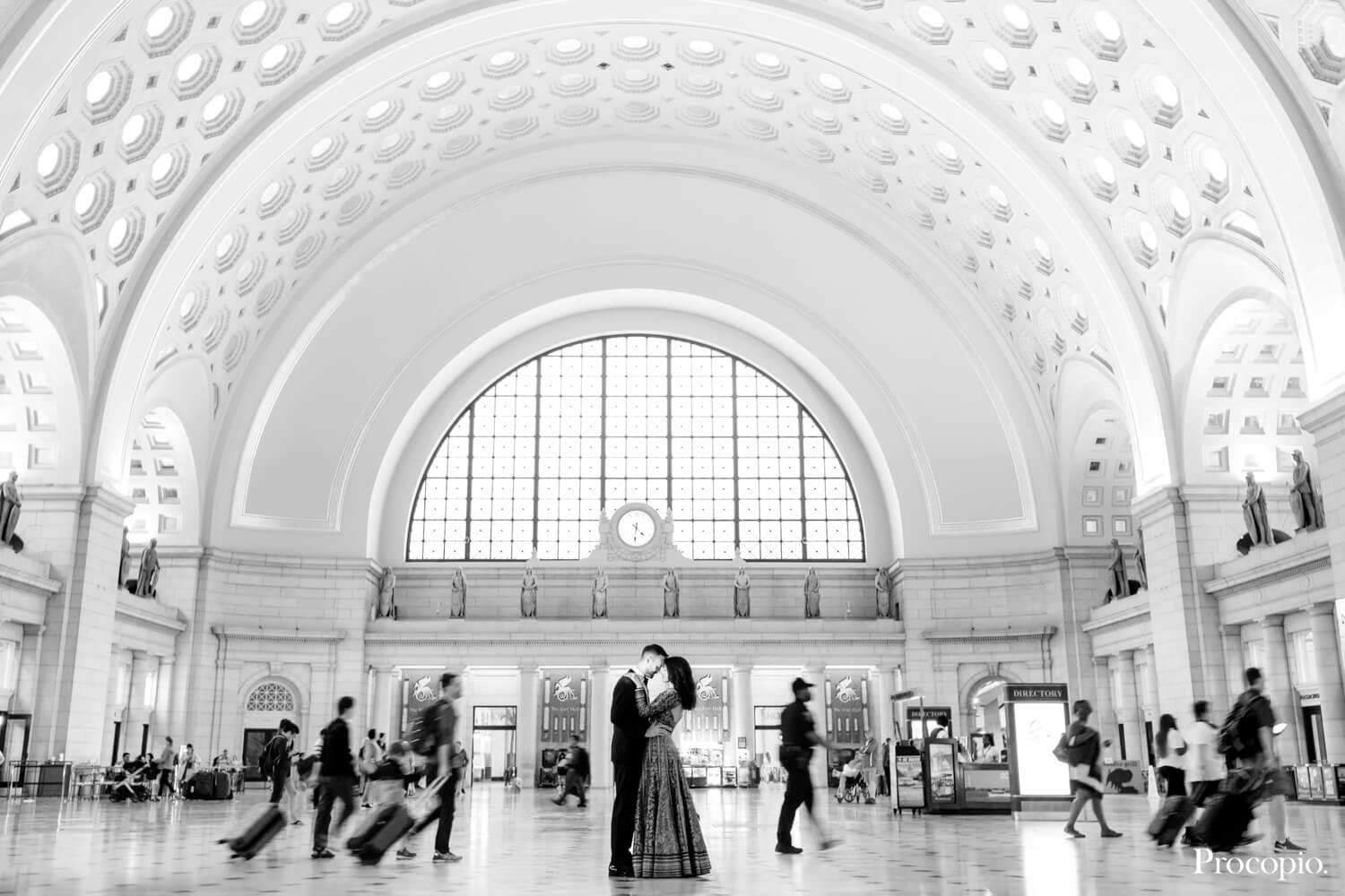 Black and white photo of couple in train station - Perfect Planning Events - best Washington DC wedding planner - photo by Procopio Photography